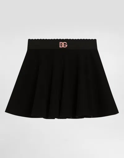 Dolce & Gabbana Double-face Jersey Skirt With Dg Logo In Black