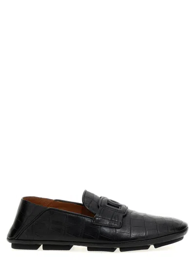 Dolce & Gabbana Dolce  Gabbana Dg Logo Embossed Almond Toe Loafers In Black