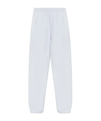Dolce & Gabbana Embroidered Cotton Fleece Sweatpants In Light Blue