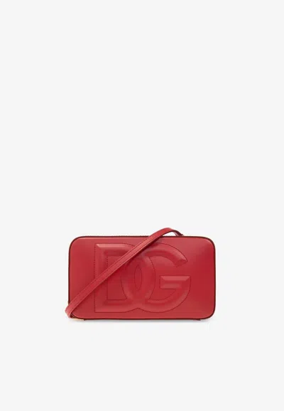 Dolce & Gabbana Embossed Dg Logo Zip Shoulder Bag In Red