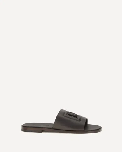 Dolce & Gabbana Embossed Logo Sandals In Black