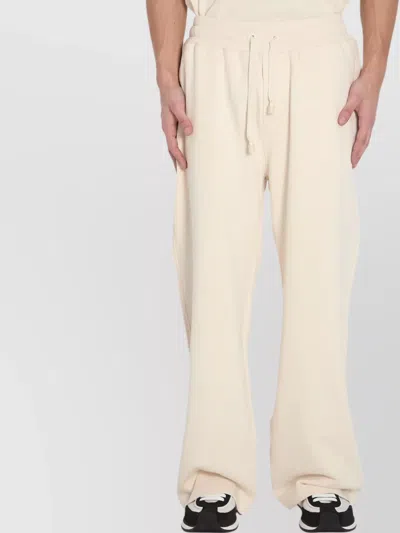 DOLCE & GABBANA EMBROIDERED STRAIGHT-LEG JOGGING TROUSERS WITH POCKETS