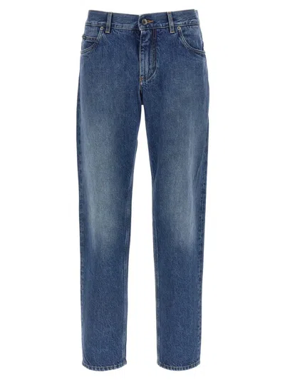 Dolce & Gabbana Logo-plaque Stonewashed Jeans In Blue