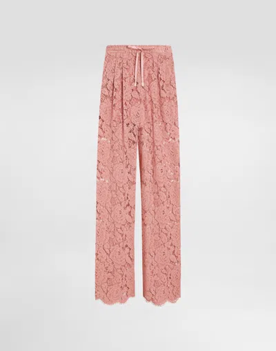 Dolce & Gabbana Flared Floral Cordonetto Lace Pants With Dg Logo In Pink