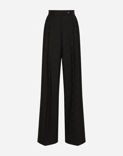 DOLCE & GABBANA FLARED WOOL JACQUARD PANTS WITH DG LOGO