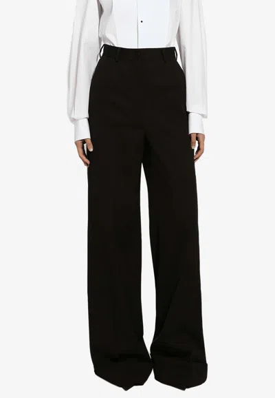 Dolce & Gabbana Flared Wool Pants In 黑色