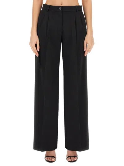 Dolce & Gabbana Flared Woolen Pants In Black