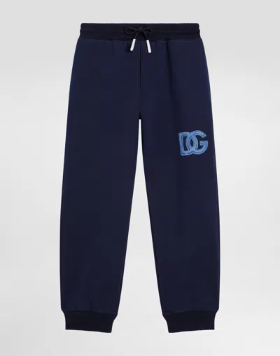 Dolce & Gabbana Fleece Trousers With Dg In Blue