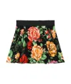 Dolce & Gabbana Interlock Skirt With Rose Print Over A Black Background In Black