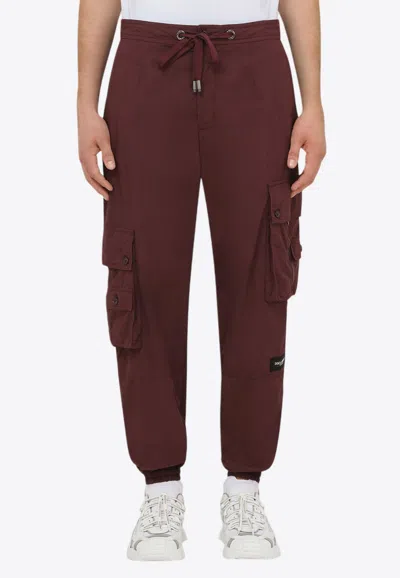 Dolce & Gabbana Garment-dyed Cargo Track Pants In Bordeaux
