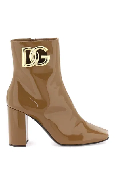 Dolce & Gabbana Glossy Leather Ankle Boots With Gold Metal Dg Logo For Women In Brown