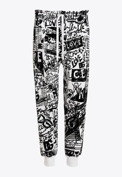 Dolce & Gabbana Graffiti Print Track Pants In Monochrome