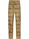 Dolce & Gabbana Printed Silk Twill Jogging Pants In Yellow