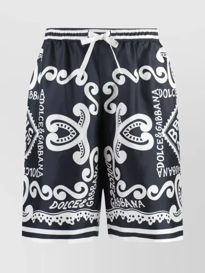 DOLCE & GABBANA GRAPHIC SILK BERMUDA SHORTS WITH ELASTIC WAISTBAND