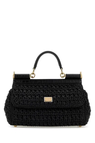 Dolce & Gabbana Handbags. In Black