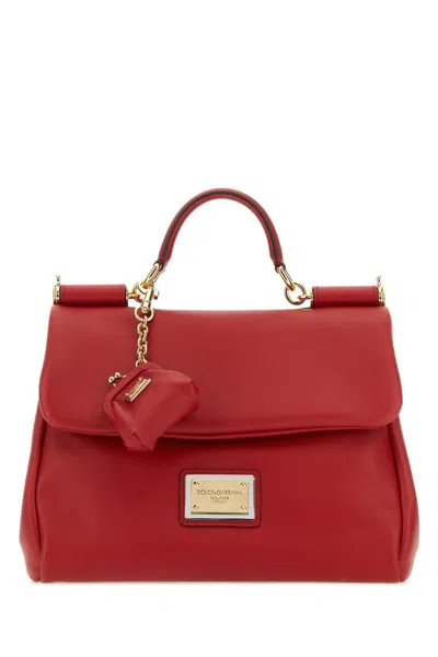 Dolce & Gabbana Handbags. In Red