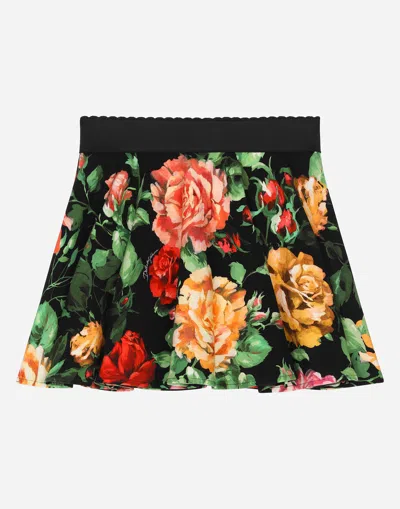 Dolce & Gabbana Kids' Interlock Skirt With Rose Print Over A Black Background