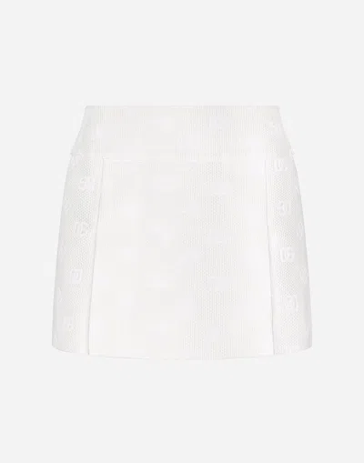 Dolce & Gabbana Jacquard Miniskirt With All-over Dg Logo In White