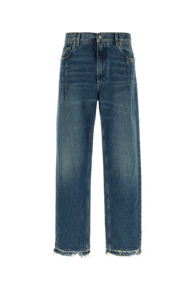 Dolce & Gabbana Faded Five-pocket Denim Trousers With Frayed Hem In Black
