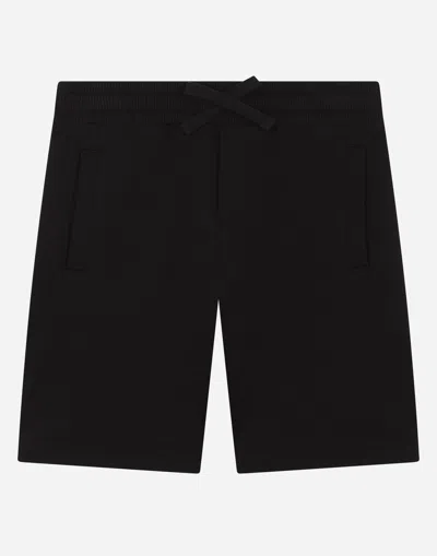 Dolce & Gabbana Jersey Bermuda Jogging Shorts With Logo Plaque In Black