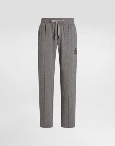 DOLCE & GABBANA JERSEY JOGGERS WITH PATCH