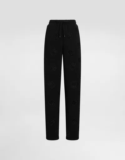 Dolce & Gabbana Jersey Jogging Pants With Cut-out And Dg Logo In Black