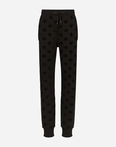 DOLCE & GABBANA JERSEY JOGGING PANTS WITH FLOCKED DG LOGO PRINT