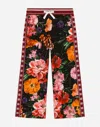 Dolce & Gabbana Jersey Jogging Pants With Floral Print Over A Black Background In Print