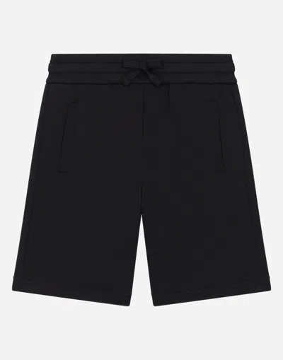 DOLCE & GABBANA FLEECE BERMUDA SHORTS WITH DG LOGO PLAQUE