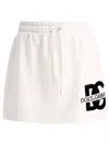 DOLCE & GABBANA JERSEY MINISKIRT WITH DG LOGO PATCH SKIRTS WHITE