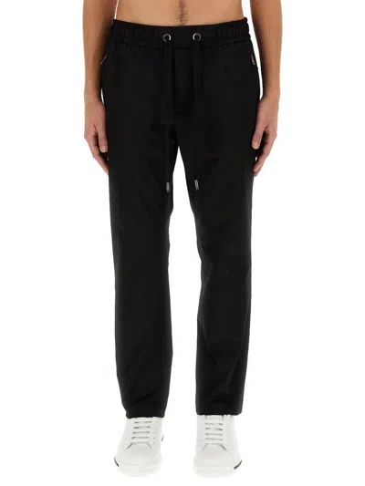 DOLCE & GABBANA DOLCE & GABBANA JOGGING PANTS WITH PLAQUE