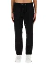 Dolce & Gabbana Jogging Pants With Plaque Detail