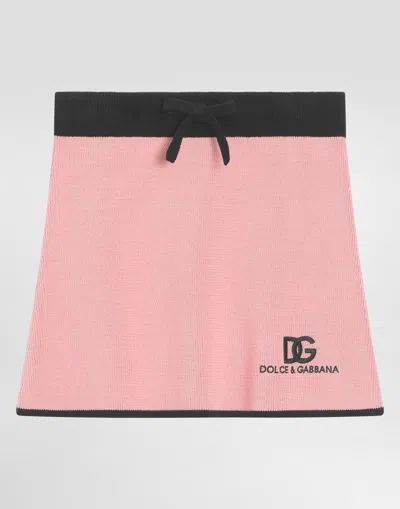 Dolce & Gabbana Knit Skirt With Dg Logo In Pink