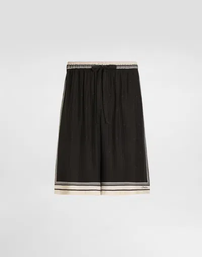 Dolce & Gabbana Logo And Stripe-print Vanity Silk Bermuda Shorts In Black