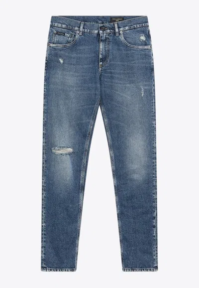 DOLCE & GABBANA LOGO PLAQUE DISTRESSED FADED JEANS