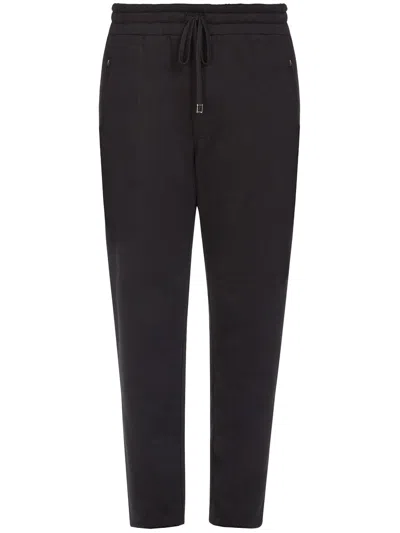 Dolce & Gabbana Logo-plaque Drawstring Track Pants In Black