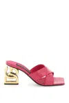 Dolce & Gabbana Logo Plaque Embossed Mules In Pink