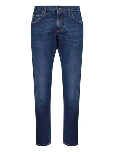 Dolce & Gabbana Dolce&gabbana Men Denim Pants With Plaque In Blue