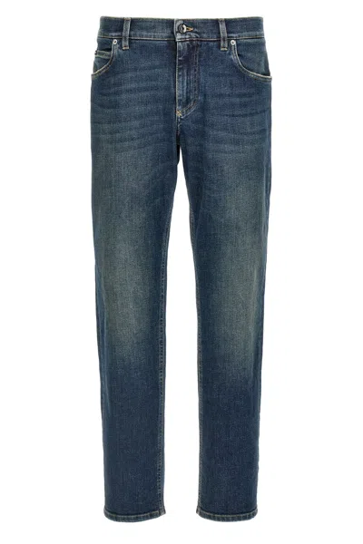 Dolce & Gabbana Logo Plaque Jeans In Blue