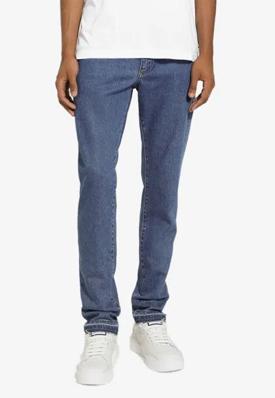Dolce & Gabbana Logo Plaque Slim Jeans In Blue