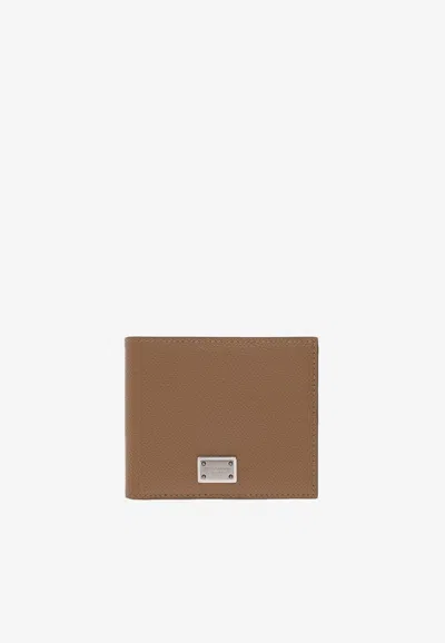Dolce & Gabbana Logo Plate Leather Bi-fold Wallet In Brown