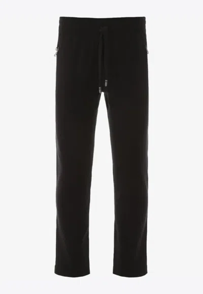 Dolce & Gabbana Logo Plate Tapered Cotton Track Pants In Black