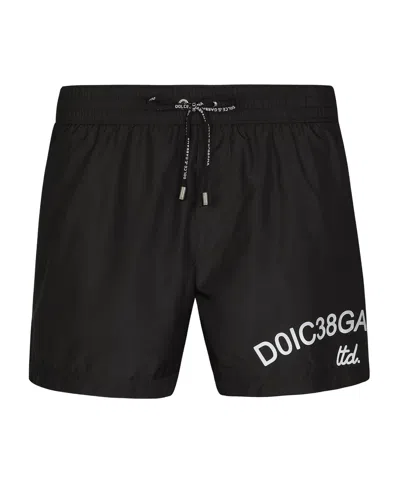DOLCE & GABBANA DOLCE  GABBANA LOGO PRINTED DRAWSTRING SWIM TRUNKS