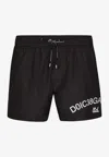 Dolce & Gabbana Black Swim Trunks With Contrasting Logo Print In Nylon Man In Black