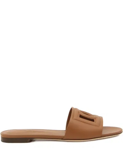 Dolce & Gabbana Slide Sandals With Cut Out Logo In Leather Woman In Brown