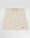 Dolce & Gabbana Lurex Jersey Skirt With Dg Logo In Gold