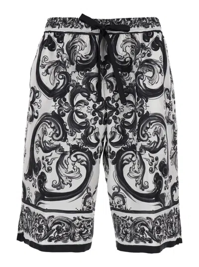DOLCE & GABBANA 'MAIOLICA' BLACK AND WHITE SHORTS WITH ELASTIC DRAWSTRING CLOSURE AND ALL-OVER PRINT IN SILK MAN