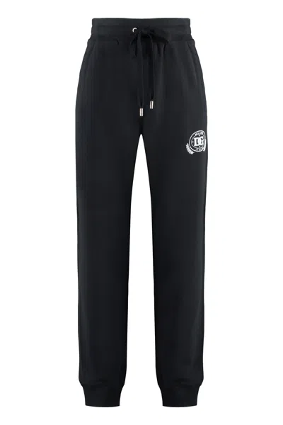 Dolce & Gabbana Logo Print Sweatpants With Zippered Pocket In Black