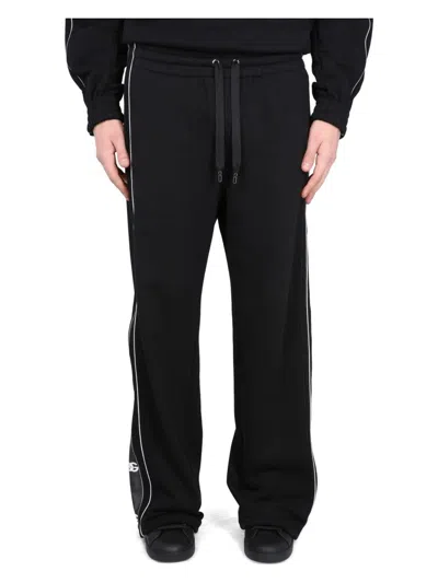 DOLCE & GABBANA MEN'S JOGGING PANTS WITH LOGO BANDS