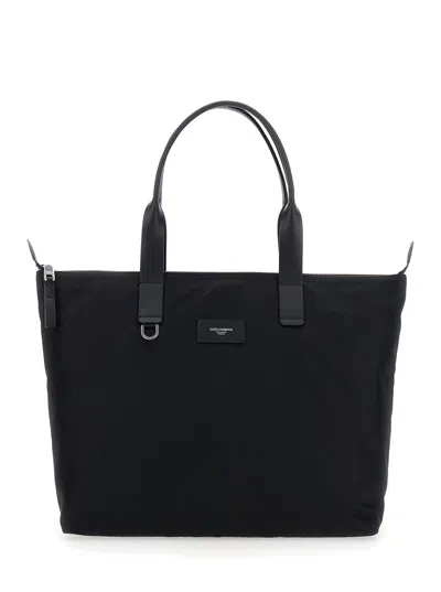 DOLCE & GABBANA DOLCE & GABBANA MEN BLACK TOTE BAG WITH TWO TOP HANDLES AND LOGO PLAQUE ON THE FRONT IN TECH FABRIC 